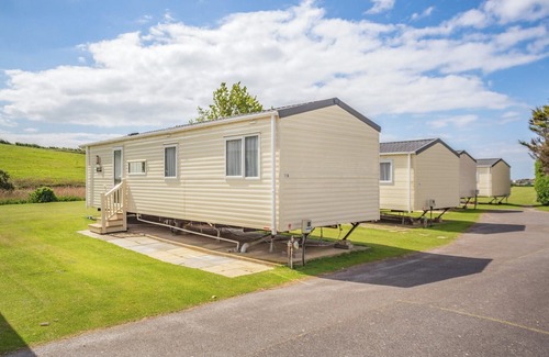 Bridport House | 12ft-wide luxury caravan with one double and two twin.