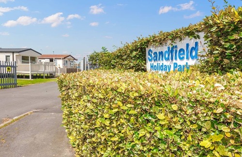 Chapel Saint Leonards House | 12ft-wide stylish and comfortable caravan with one double and two twin.