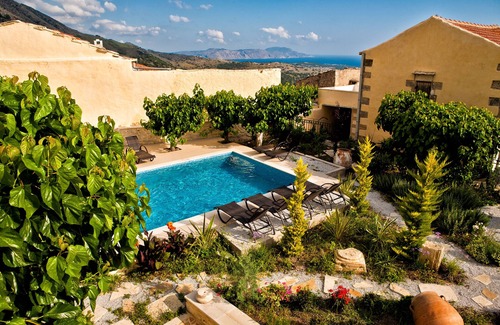 Argyroupoli Apartment | 14th century Venetian open plan stone suite with sharing pool & private terrace