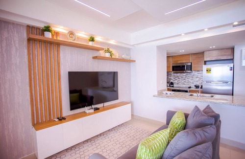 Juan Dolio - El Pueblo Apartment | 14th Floor Modern Ocean, Beach & Pool View Apartment in Juan Dolio