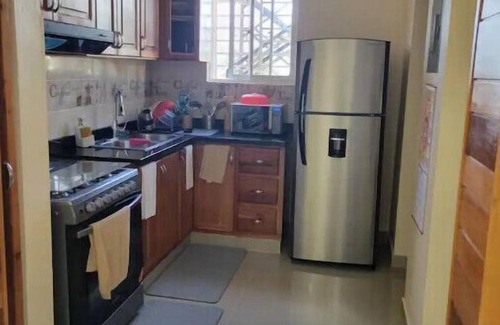 Prado Oriental Apartment | 15 minutes to Las Americas Airport. Family sized condo