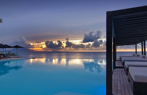 El Batey Apartment | 1BD beachfront condo in gated luxury residence, gym/pool, near everything