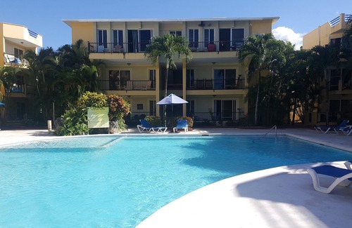 El Batey Apartment | 1BD guest-friendly condo near everything, with pool, wifi, cable TV