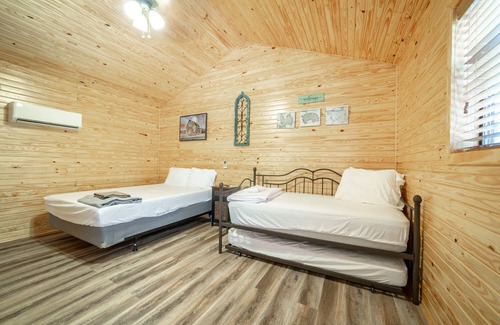Ramer House | 1bd rm, 1 bth, hotel style cabin w/Mini fridge, micro, & tv, at Kick Back Ranch