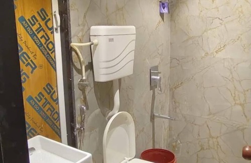 Kharghar Apartment | 1BHK flat fully furnished bedroom, hallway with single bed balconies.