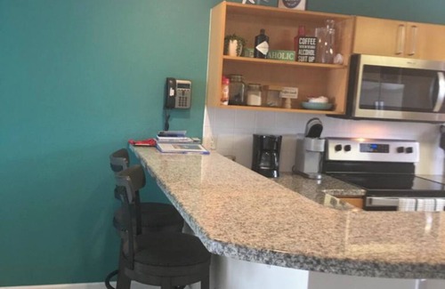 Colliers Bay Condo | 1st floor beachfront condo, just steps away from a private beach, beautiful view