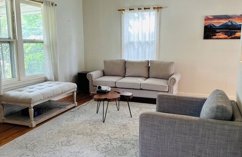 North Loop House | 2-3 BR house with big fenced yard & private carport