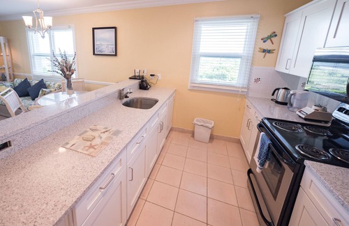 Wheeland Settlement Condo | 2 Bdrm Condo Located At Northwest Point Resort. Enjoy Beach-Pool -Hot Tub-views