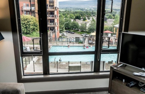 South Pandosy Apartment | 2 Bed 2 Bath Corner Unit Overlooking Pool #501