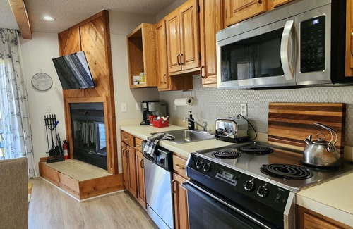 Mancelona Condo | 2 bedroom 2 full baths, PRIVATE heated pool, sleeps 6, Near LAKES, Schuss course