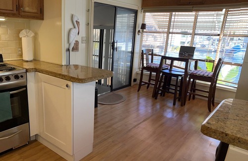 Key Largo Cottage | 2 bedroom & 25' Boat Dock ~ Waterfront Atlantic Side & PrivateTiki dining, bikes
