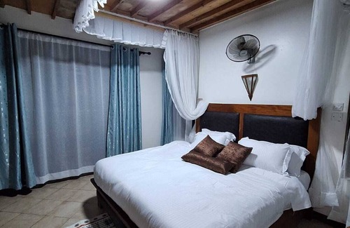 Diani Beach Resort | 2-bedroom apartment in Diani, 2 minutes drive/5 minutes walk to the beach.