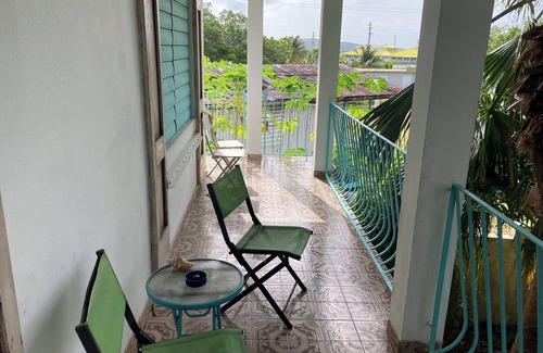 Culebra Pueblo Apartment | 2-bedroom apartment in Culebra, wrap around porch and roof deck with ocean view!