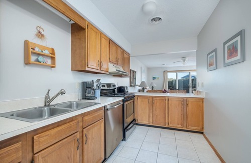 Sea Acres House | 2 bedroom condo with WiFi, outdoor shower, and access to Georgetown Sands community pool and tennis