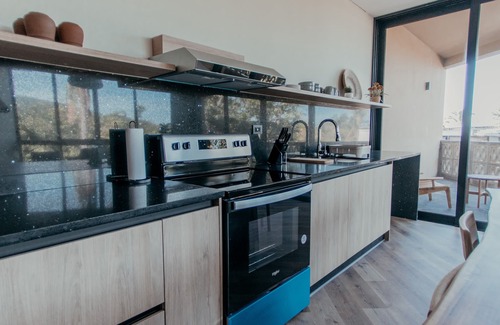 El Zonte Condo | 2-Bedroom Partial Ocean View with Balcony (King Master Plus Bunk Beds)