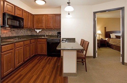 West Valley City Condo | 2 Bedroom Suite Close to Salt Palace Convention Center! Free Breakfast Buffet. Pool, Hot Tub & Waterslide Access.