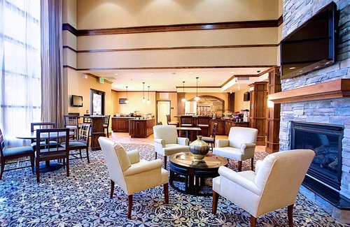 West Valley City Condo | 2 Bedroom Suite Close to Salt Palace Convention Center! Free Breakfast Buffet. Pool, Hot Tub & Waterslide Access.