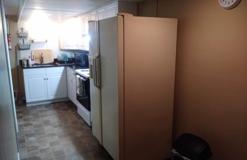 Witmer House | 2 bedroom suite with a full kitchen, living room, and a full bathroom.