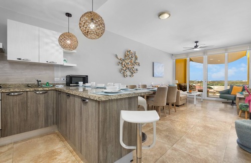 Boegoeroei Condo | 2 bedrooms and 2 baths in a tropical setting. Amazing outdoor spaces and a very convenient location. Less than 2 miles from stunning Eagle Beach and the High-rise hotel district with shopping, casinos and restaurants.