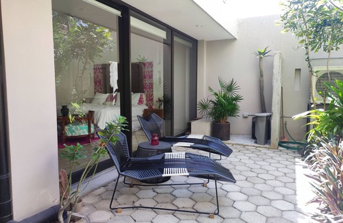 Crucecita Condo | 2 BR Patio Oasis Steps from Beach & Supermarket