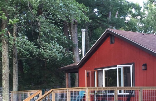 Baldwin Cottage | 2 cottages on Whalen lake/ Baldwin MI Sleeps 12. Steps from sandy beach