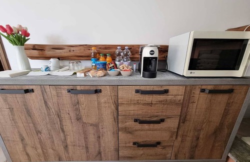 Capoterra House | 2 DOUBLE BEDS, MINI FRIDGE, COFFEE MACHINE, MICROWAVE OVEN, TABLE.