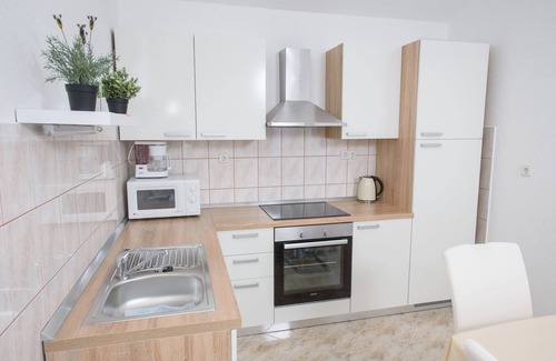 Kastel Stafilic Apartment | 2 minutes walk to the beach, Seaview apartment with seaview terrace, BBQ,parking