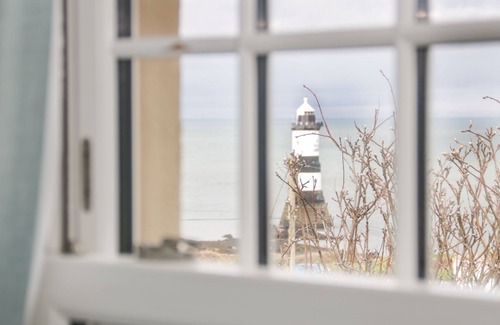 Penmon Cottage | 2 OLD COASTGUARD HOUSE, pet friendly, with open fire in Beaumaris