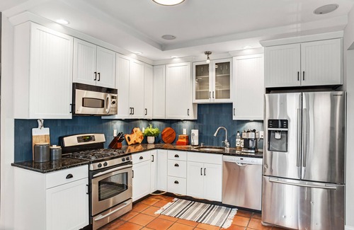 Eastport House | 2-story downtown home with enclosed yard, deck, firepit, gas grill & fireplace