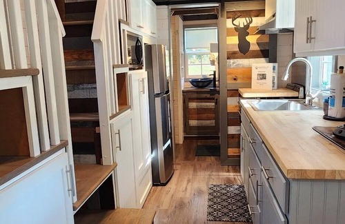 Mill Spring House | 2-story tiny home on the creek, full kitchen, close to pool and playground, sleeps 4.