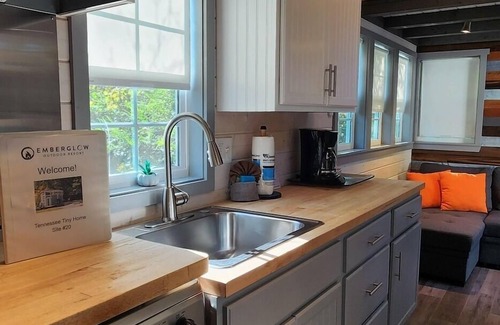Mill Spring House | 2-story tiny home on the creek, full kitchen, close to pool and playground, sleeps 4.