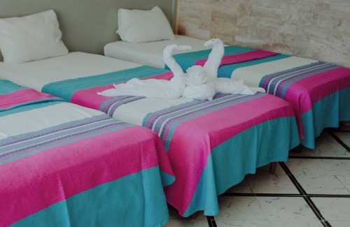 Merida Municipality Hotel | 2 Triple Rooms at Mérida, Perfect for Families & Poolside Relaxation