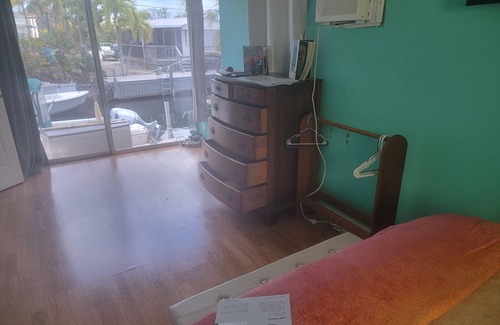 Little Torch Key House | 20 ft from your room to a clean canal full of fish and lobsters and crabs.