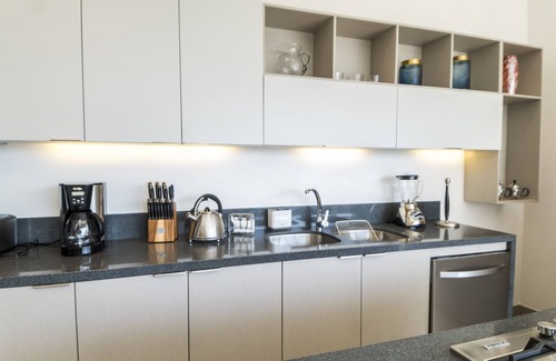 Emiliano Zapata Condo | 2BD/3BA Wrap Around Terrace Rooftop Pool Gym and Parking