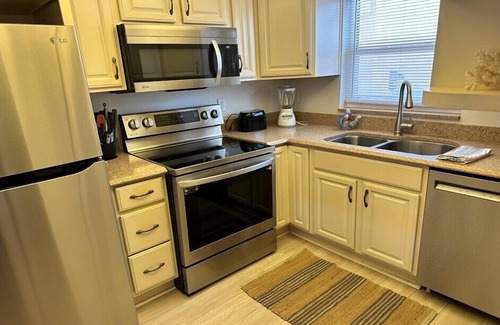 Avon By The Sea Condo | 2BR Beachfront Condo W/Pool BBQ Steps To Dining, Shopping Pier & More!