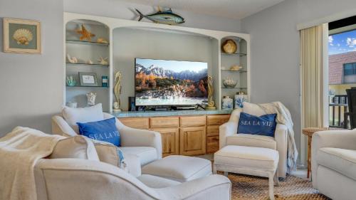 Avon By The Sea House | 2BR Beachfront Condo with Pool BBQ & Steps To Pier