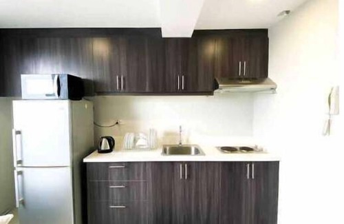 Valencia Apartment | 2BR in Gilmore near Robinsons Magnolia w/Parking