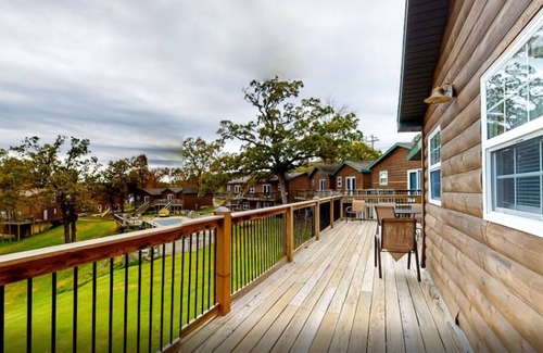 Indian Point Condo | 2BR Waterfront Duplex Cabin w/Pool + Swim & Boat dock