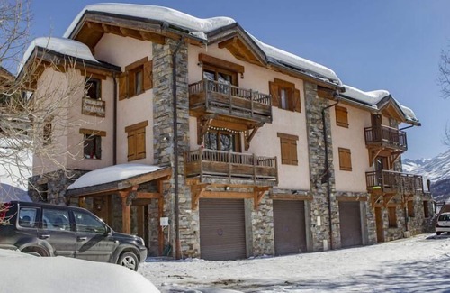 Saint-Marcel Apartment | 2nd floor, fitness, sauna, balcony, fireplace or stove, parking, tv, ski locker, 115m²