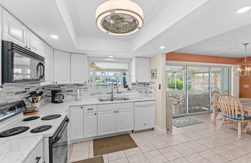 Gulf Harbors House | 3/2 Waterfront Canal Home w/Private Pool, Kayaks, Gulf Access, Dock, Fishing, Dolphins