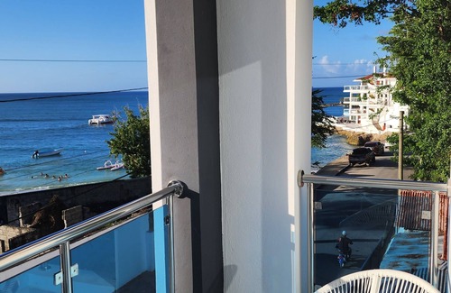 North Coast Condo | 3 bd condo with rooftop across the street from beach!