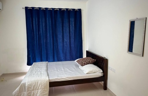 Vadanemelli House | 3-bedroom apartment in delightful Kanathur with AC, and spacious living area.