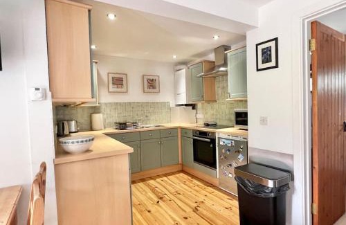 Chillington House | 3 bedroom barn conversion with swimming pool, tennis court and more!