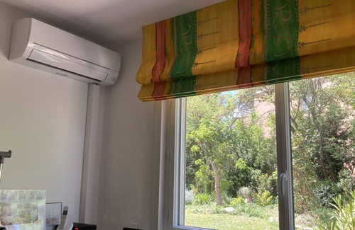 Couronne Urbaine Apartment | 3 bedrooms, large garden, 10-minute walk from center, air-conditioned, parking.