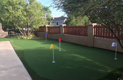 Northeast Heights House | 3 BR 2 BA Guest House with heated pool, hot tub, outdoor kitchen & putting range