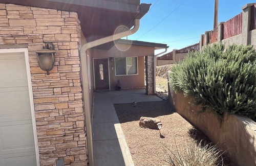 Northeast Heights House | 3 BR 2 BA Guest House with heated pool, hot tub, outdoor kitchen & putting range