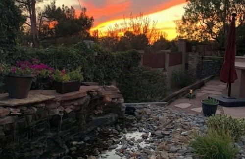 Northeast Heights House | 3 BR 2 BA Guest House with heated pool, hot tub, outdoor kitchen & putting range