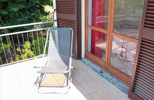 Brezzo di Bedero Apartment | 3-room apartment with separate kitchen and balcony right on the beach