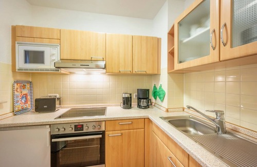 Schillig Apartment | 3-room apartment close to the beach with balcony and located directly on the North Sea dike
