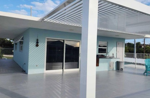 Cross Key Waterways House | 3 Rooms Stunning Paradise Waterfront Getaway! Ocean access in Key Largo Florida.